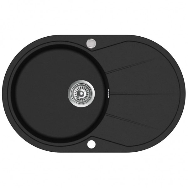 Fregadero de cocina de granito con un seno ovalado negro